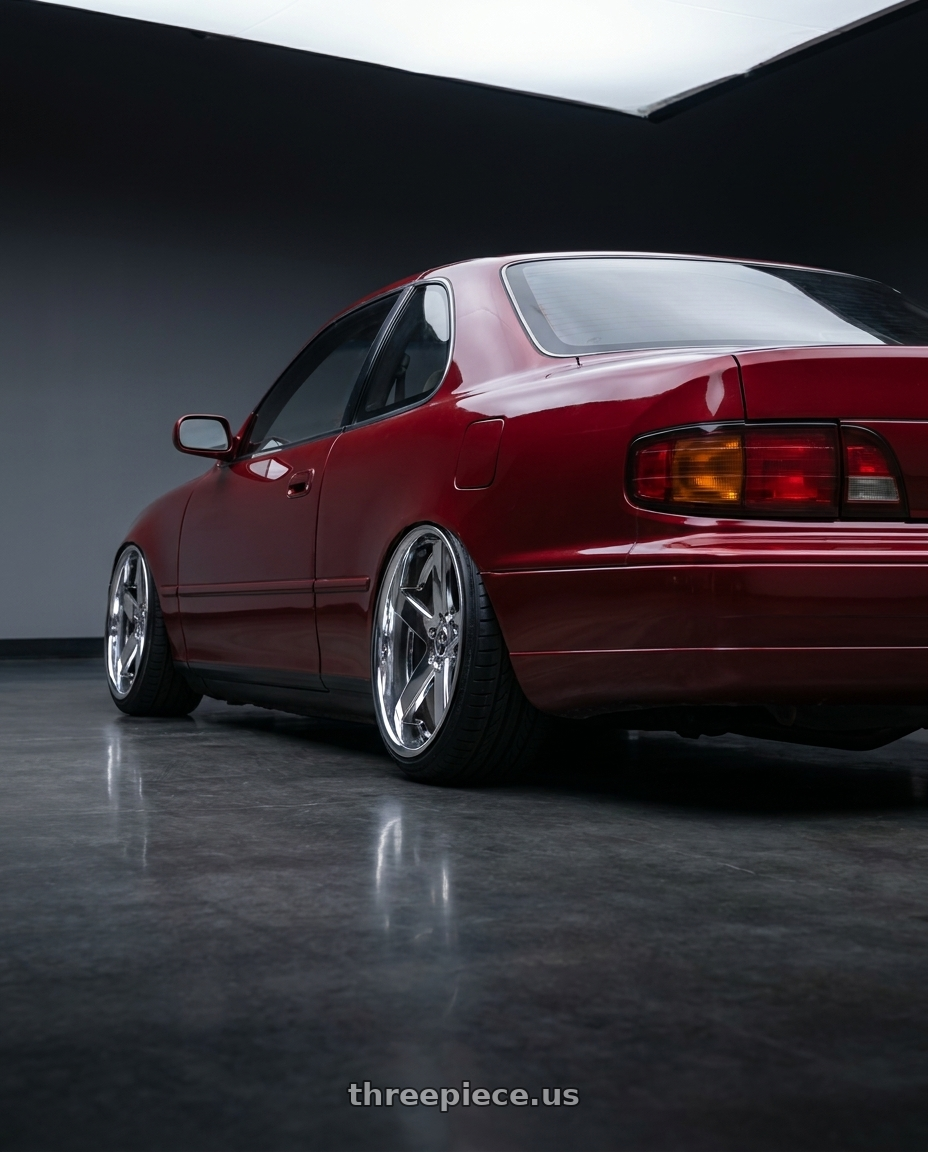 1995 Toyota Camry Coupe with DUB 1PC S115 BALLER 5X114.3 22X8.5 +38 CHROME PLATED wheels rear three quarter view extreme stretch tires