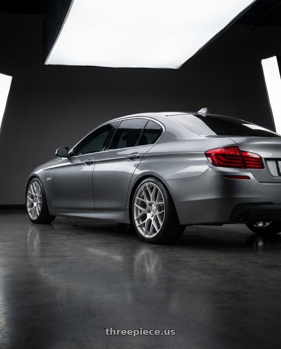 2016 BMW 5 Series F10 with Aodhan AFF2 5x120 19x8.5+35 Gloss Silver Machined Face wheels rear three quarter view square tires