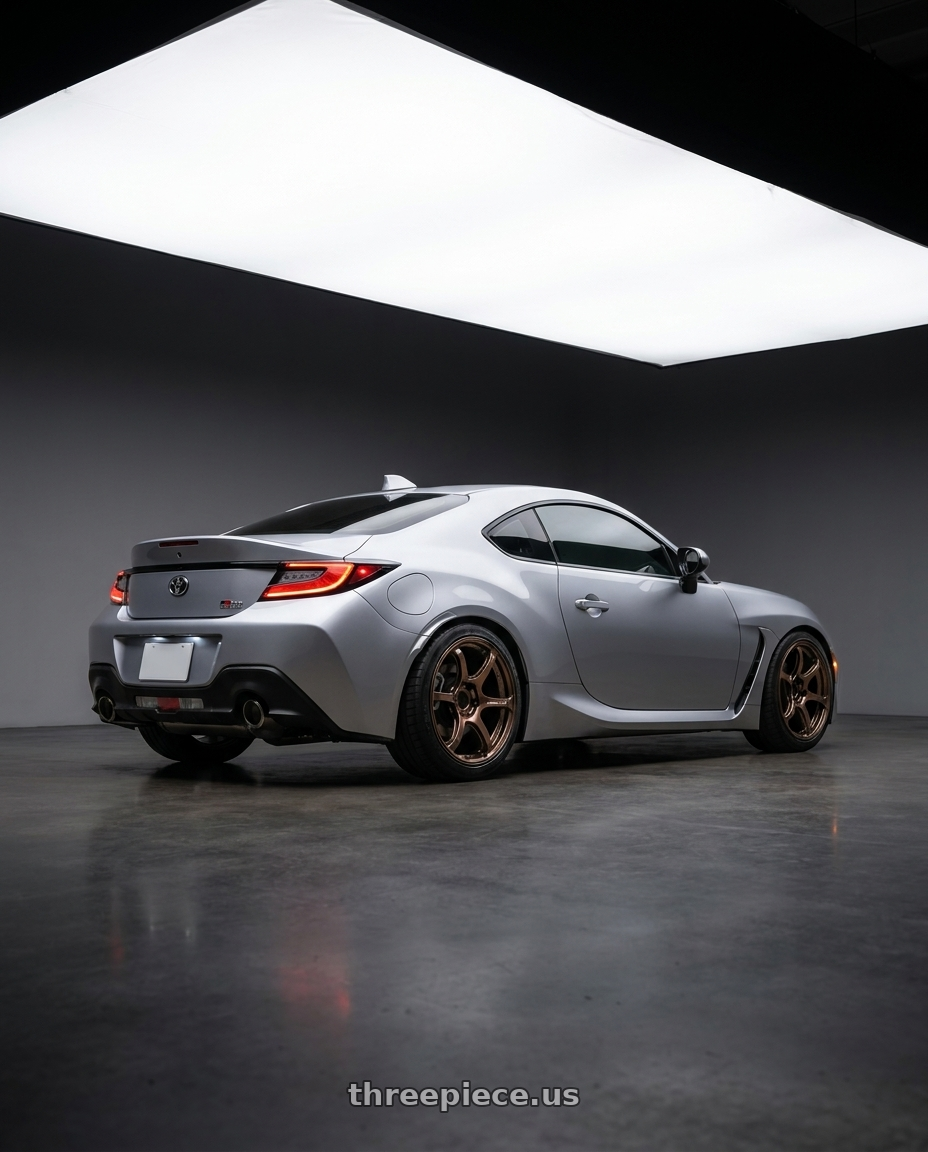 2024 toyota gr86 with Advan Racing RG-4 5x100 18x9.5 +45 RACING COPPER BRONZE wheels rear three quarter view square tires