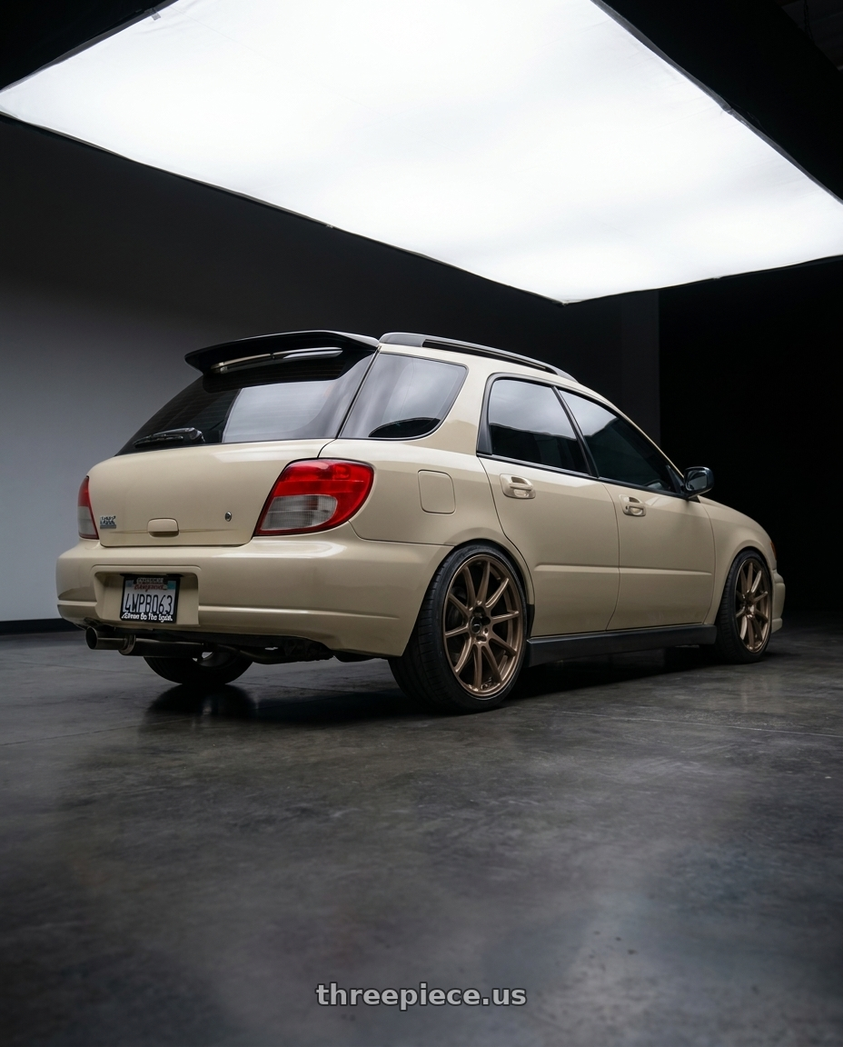 2002 subaru wrx wagon with Enkei Triumph 5x100 18x8.5+45 Matte Bronze wheels rear three quarter view slight stretch tires
