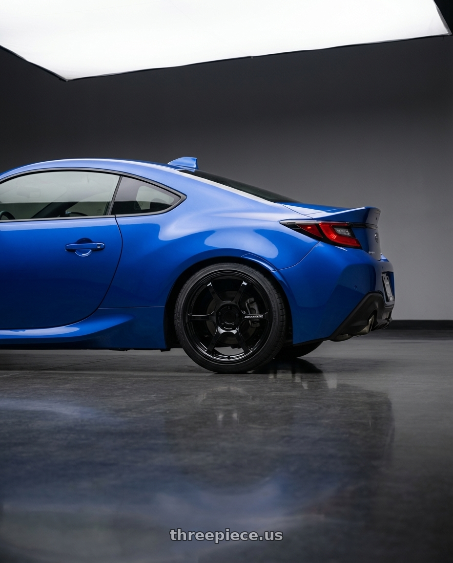 2024 Subaru BRZ with Advan RGIII 5x114.3 18x10.5+15 Gloss Black wheels rear three quarter view square tires