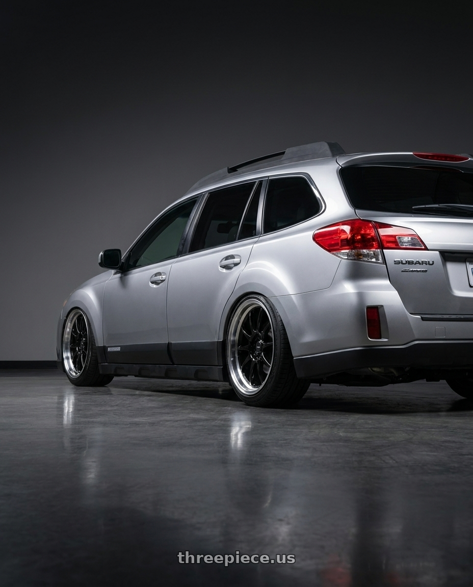 2012 Subaru outback with Konig SSM 5x100 18x9+42 Gloss Black w/ Machined Lip wheels rear three quarter view slight stretch tires