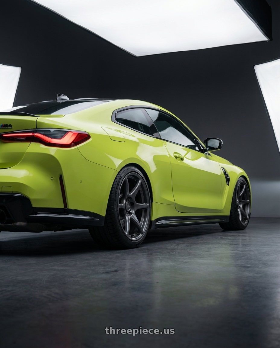 2024 BMW M4 G82 with Kansei K11G Tandem 5X112 19x9.5 22 Gunmetal wheels rear three quarter view square tires