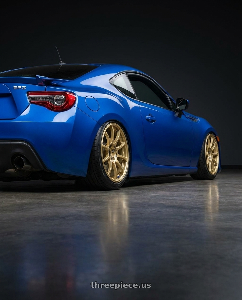 2017 Subaru BRZ with Advan RCIII 5x100 17x7.5+48 Gold wheels rear three quarter view slight stretch tires