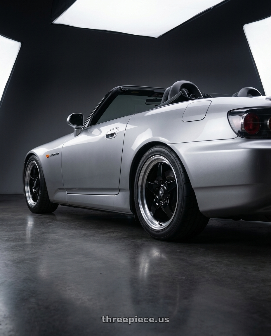 2009 Honda S2000 with Forgestar D5 Drag 5x114.3 17x5 -21 Gloss Black Machined wheels rear three quarter view square tires