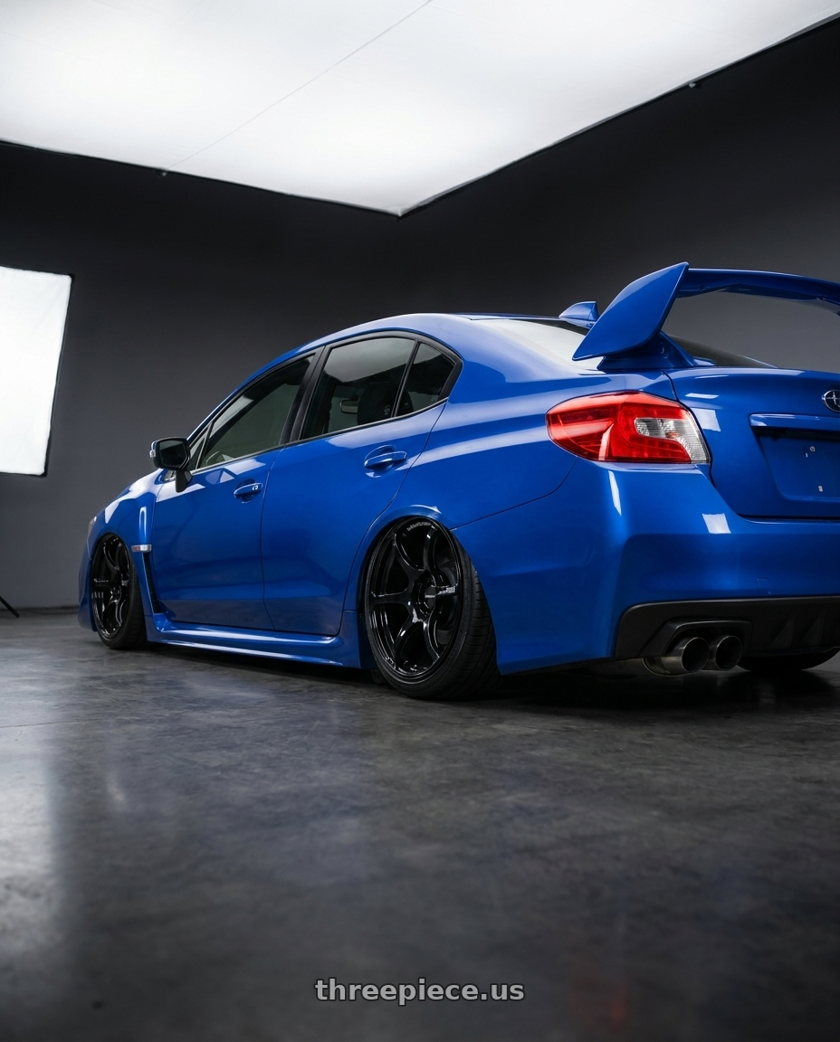 2013 Subaru WRX STI with Advan RGIII 5x114.3 18x8.5+31 Gloss Black wheels rear three quarter view slight stretch tires