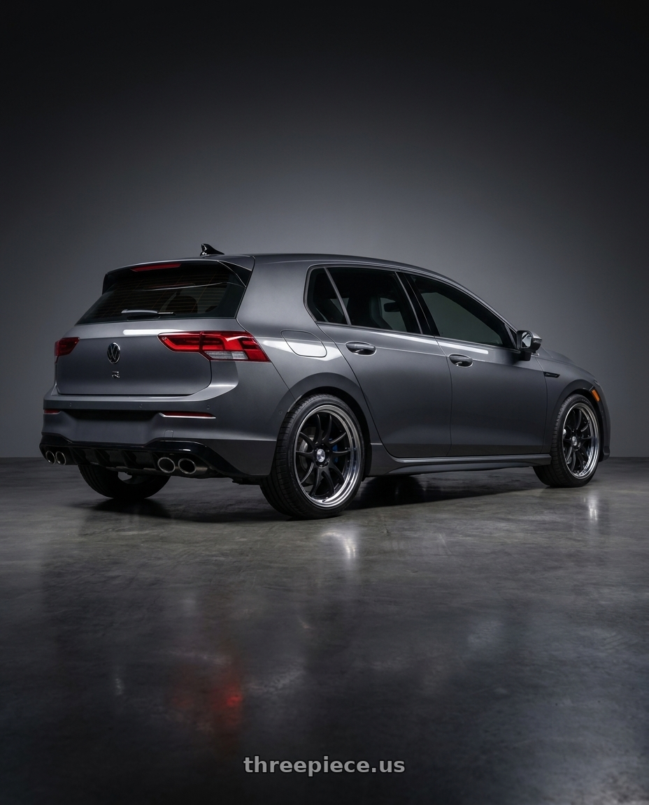 2026 Volkswagen Golf R Graphite with Work Cr 2P 5x112 18x8.5 +45 Matte Black wheels rear three quarter view square tires