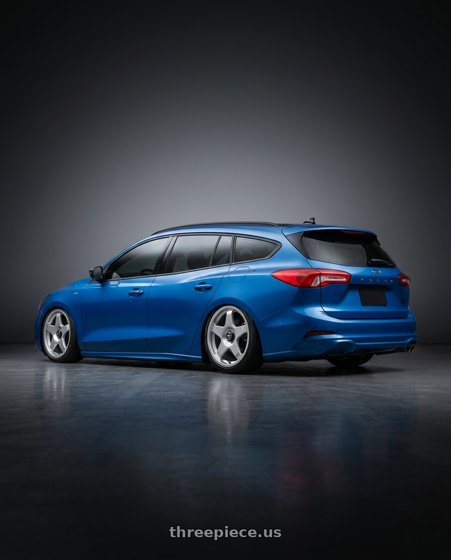 2024 ford focus wagon with fifteen52 CHICANE 5x114.3 / 5x120 19x8.5 +35 SPEED SILVER (GLOSS SILVER) wheels rear three quarter view slight stretch tires