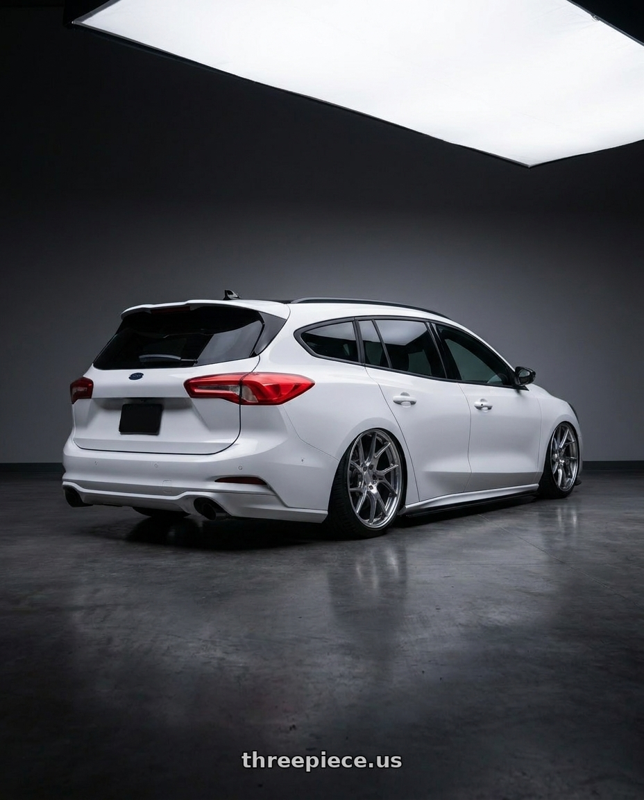 2020 ford focus st wagon with BBS LM-R 5x120 19x8.5+28 Diamond Silver wheels rear three quarter view square tires