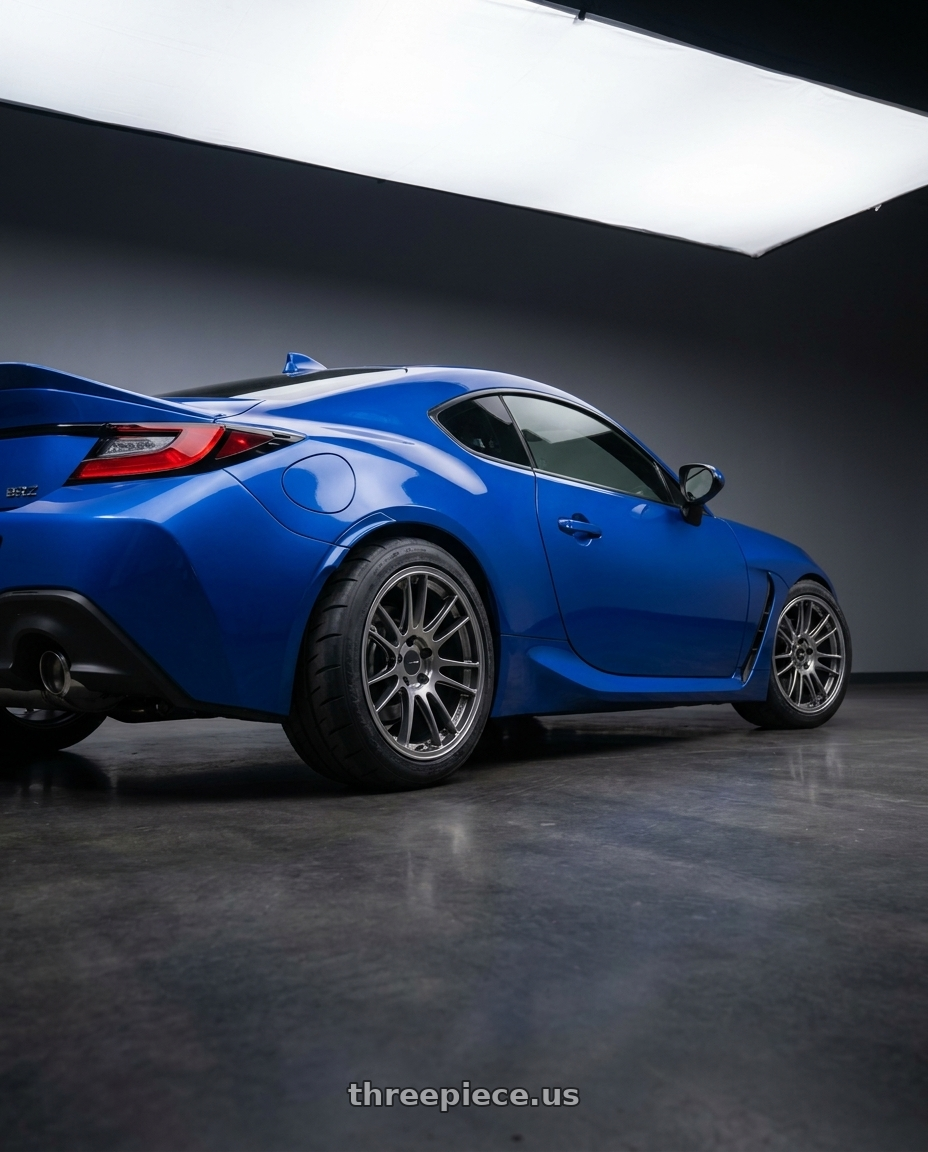 2022 subaru brz with Enkei GTC01 5x112 17x8+50 Hyper Black wheels rear three quarter view meaty tires