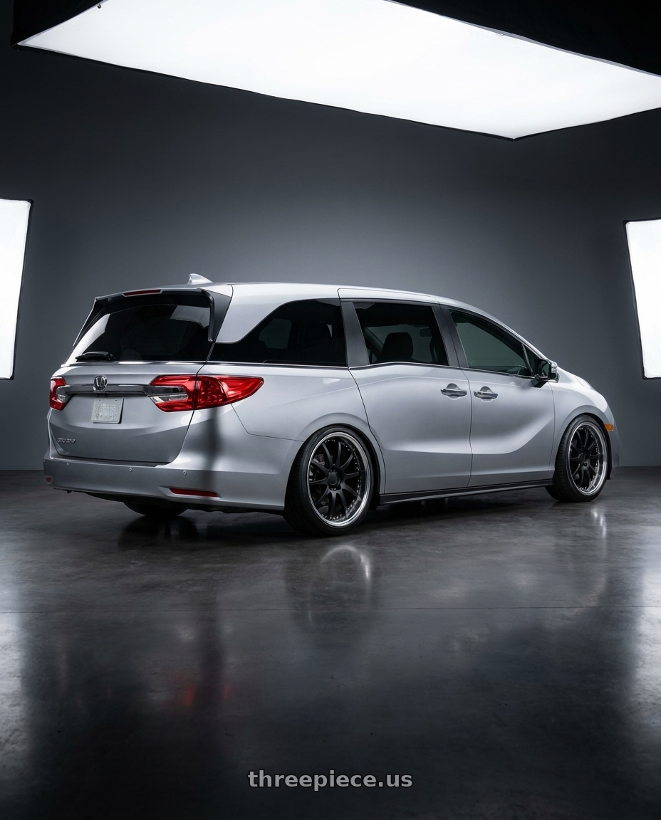 2024 Honda Odyssey with Work Gnosis Cvs 5x120 20x8+45 O Disk Matte Black wheels rear three quarter view slight stretch tires