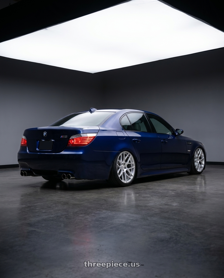 2010 BMW M5 E60 with Aodhan AFF2 5x120 20x10.5+35 Gloss Silver Machined Face wheels rear three quarter view slight stretch tires