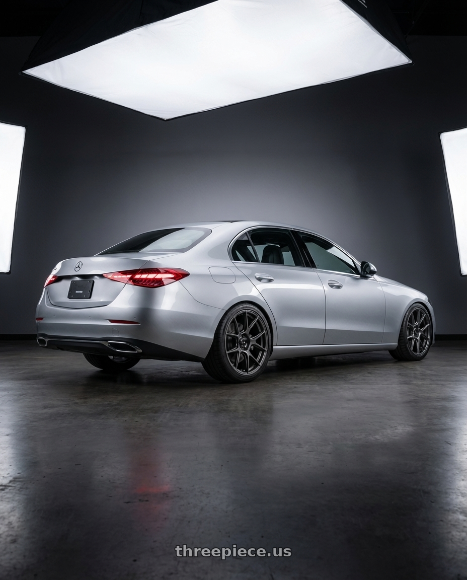 2022 Mercedes-Benz C-Class W206 with Konig Ampliform 5x112 19x8.5+32 Dark Metallic Graphite wheels rear three quarter view square tires