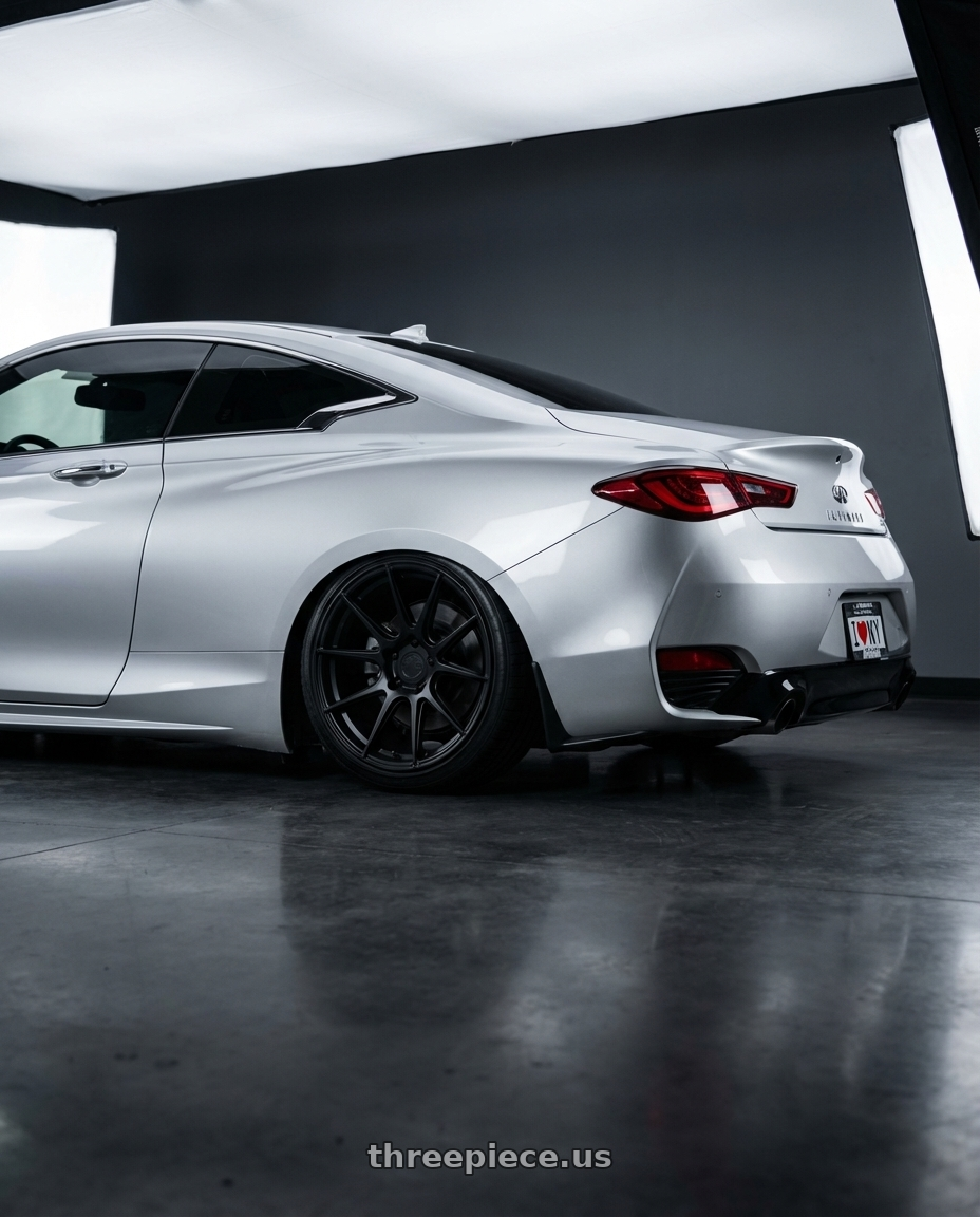 2020 Infiniti Q60 with Aodhan AFF1 5x114.3 20x9+32 Matte Black wheels rear three quarter view slight stretch tires