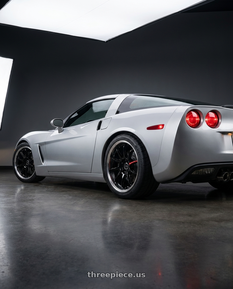 2005 Chevrolet Corvette with Emotion ZR10 2P wheels rear three quarter view meaty tires