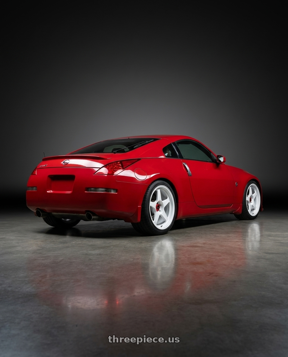 2003 Nissan 350z Touring with R6061 Forged R1 5x114.3 18X8.5 +35 Championship White wheels rear three quarter view square tires