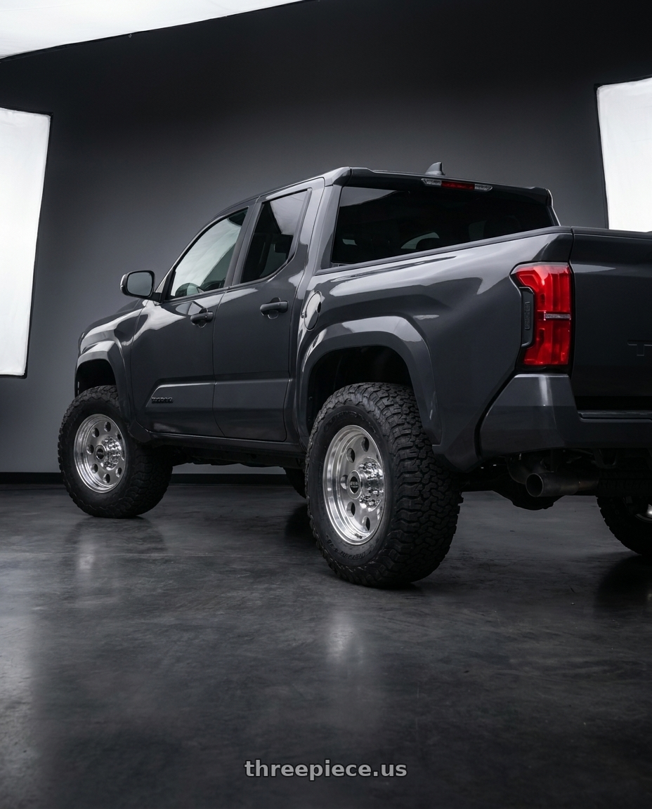 toyota tacoma 4th gen 2024 sr rwd with American Racing AR172 BAJA 6X139.7 17X8 0 POLISHED wheels rear three quarter view meaty tires
