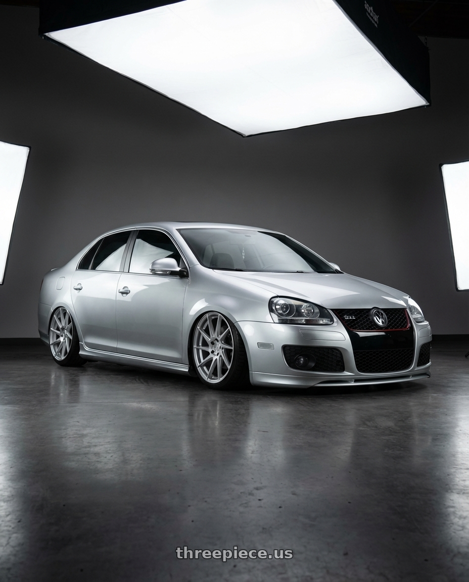 2009 Volkswagen Jetta GLI MK5 with Aodhan AH09 5x112 18x9.5 +35 Gloss Silver Machined Face wheels