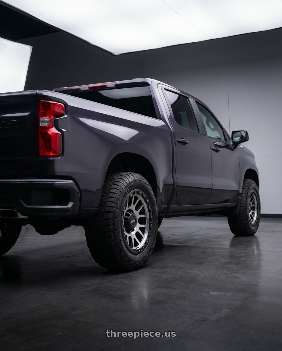 2023 Chevrolet Silverado 1500 with Vision Off-Road 111 Nemesis 6x139.7 20x9+12 Matte Black Machined Face wheels rear three quarter view meaty tires