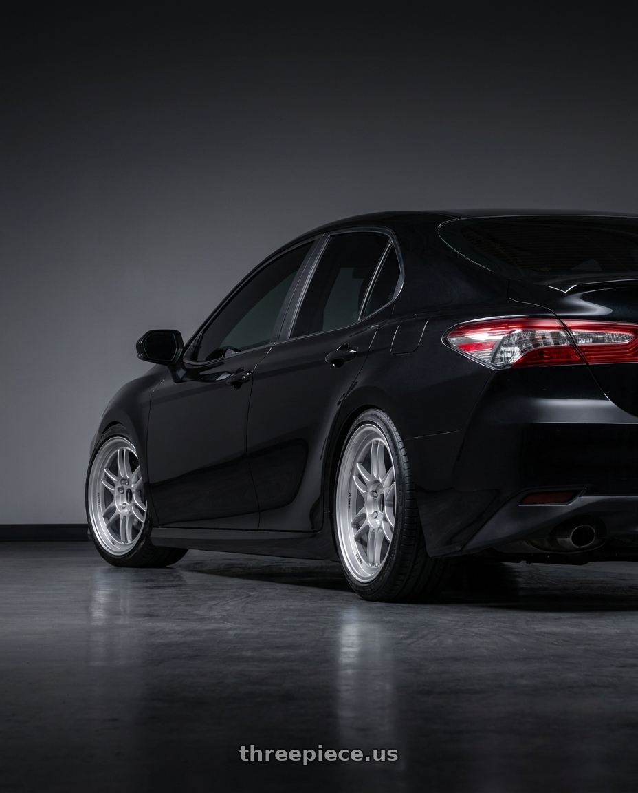 2019 toyota camry with Enkei RPF1 5x114.3 18x8.5+40 Silver wheels rear three quarter view slight stretch tires