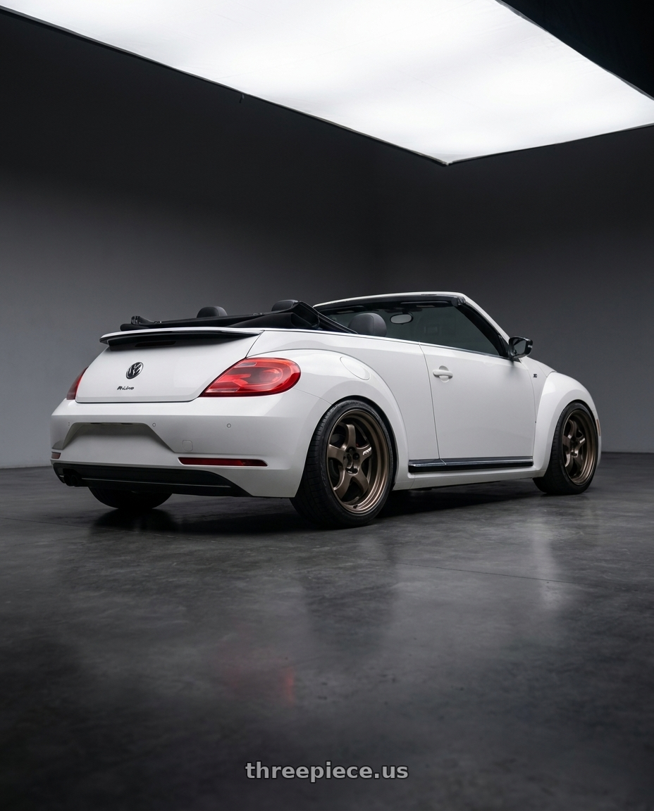 2015 Volkswagen Beetle r line with Work Meister S1R 4x100 16x6.5+0 A Disk Ashdot Titanium wheels rear three quarter view slight stretch tires