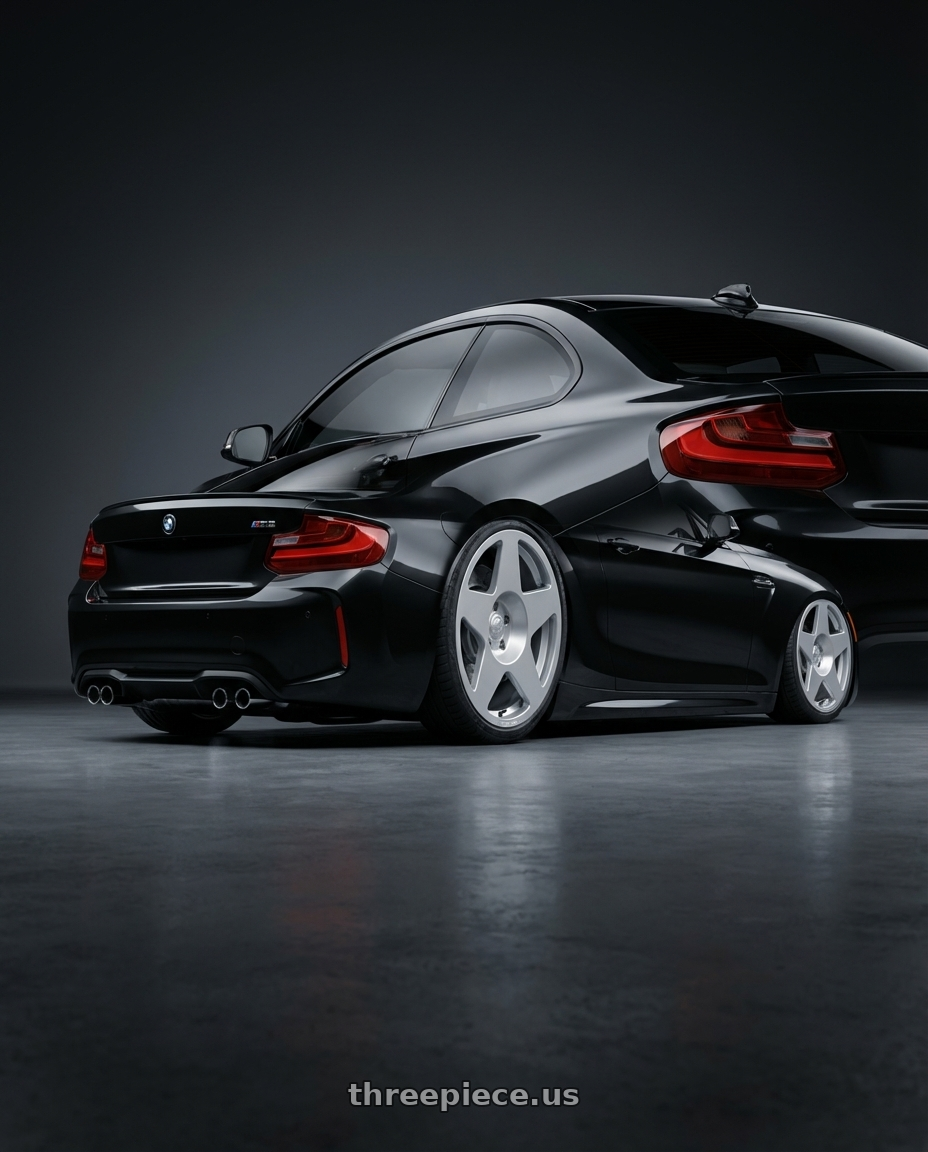 2017 bmw m2  with fifteen52 Tarmac 5x114.3 18X8.5 +30 SPEED SILVER (GLOSS SILVER) wheels rear three quarter view slight stretch tires