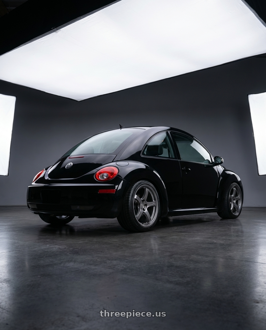 2006 Volkswagen New Beetle with Gram Lights 57CR 5x114.3 18x9.5+38 Glossy Grey wheels rear three quarter view square tires