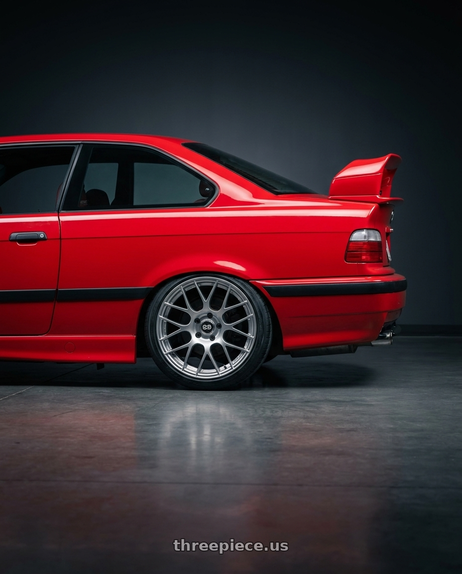 1996 BMW M3 with Enkei Raijin 5x120 18x8.5+38 Hyper Silver wheels rear three quarter view slight stretch tires
