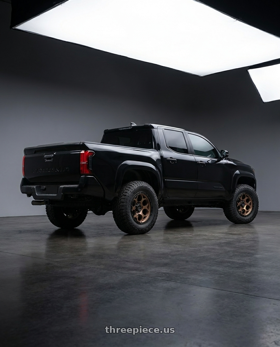 toyota tacoma 4th gen 2024 sr rwd with KMC KM541 DIRTY HARRY 6X139.7 20X9 +0 MATTE BRONZE WITH BLACK LIP wheels rear three quarter view meaty tires