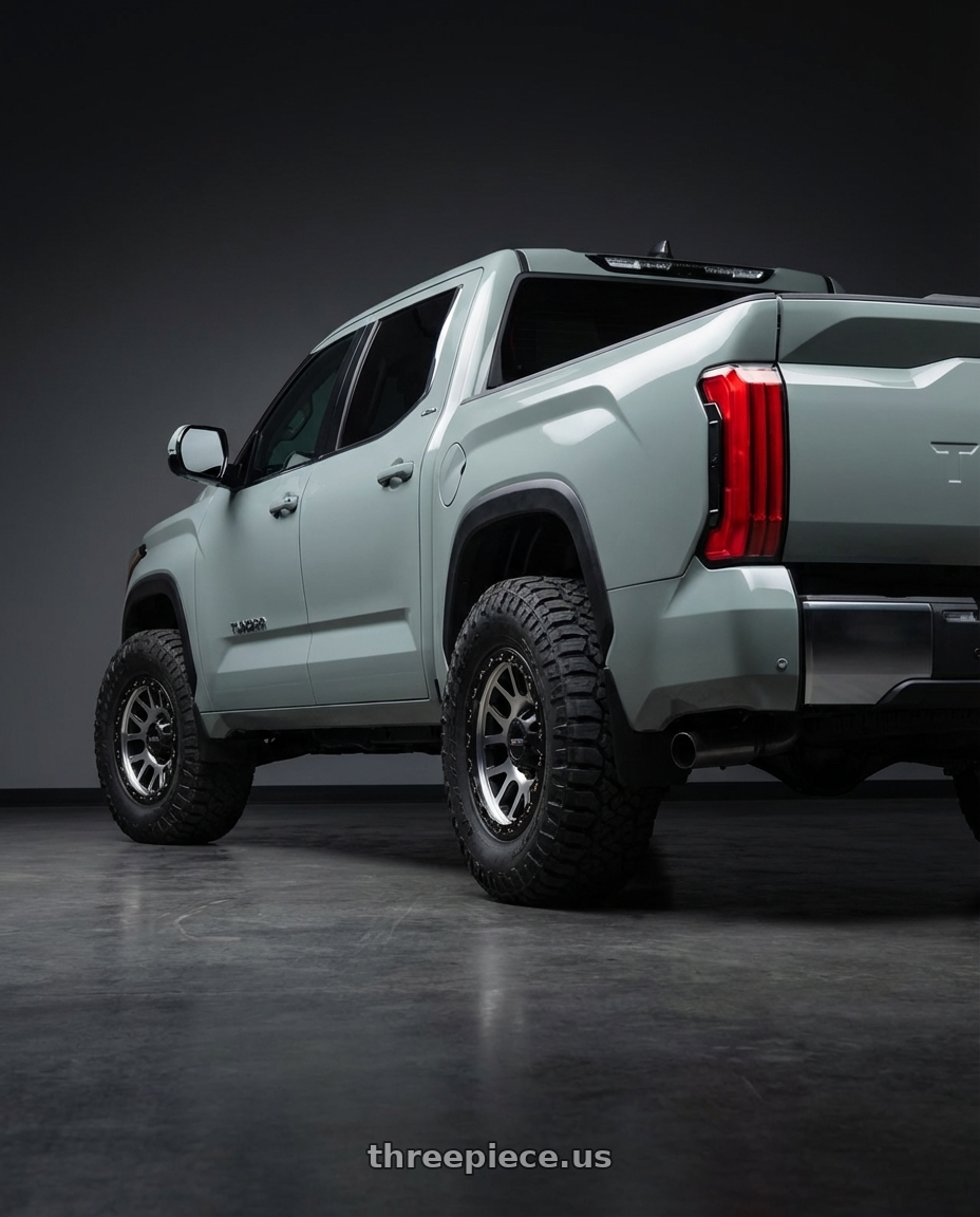 2024 Toyota Tundra with Vision Off-Road 111 Nemesis 6x139.7 20x9+12 Matte Black Machined Face wheels rear three quarter view meaty tires