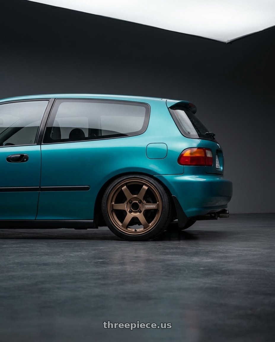 1995 honda civic with Volk Racing TE37 SONIC 4x100 15x7+35 Bronze wheels rear three quarter view square tires