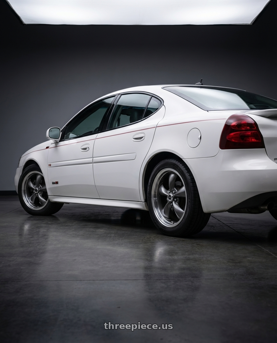 2004 Pontiac grand Prix white with American Racing AR105 TORQ THRUST M 5X120.65 17X9 +45 ANTHRACITE W/ MACHINED LIP wheels rear three quarter view square tires