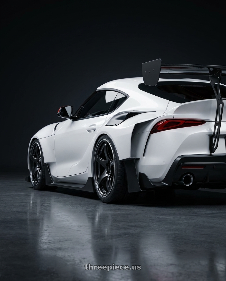 2023 toyota supra with Advan Racing TC4 4x100 17x6.5 +40 BLACK GUNMETALLIC & RING wheels rear three quarter view square tires