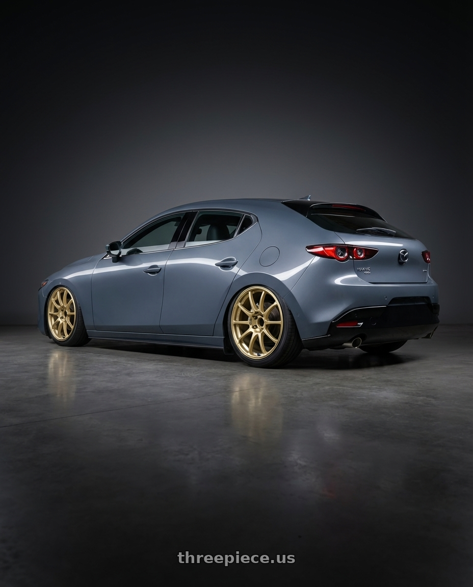 2023 Mazda Mazda3 Turbo with Advan RCIII 5x114.3 18x7.5+45 Gold wheels rear three quarter view slight stretch tires