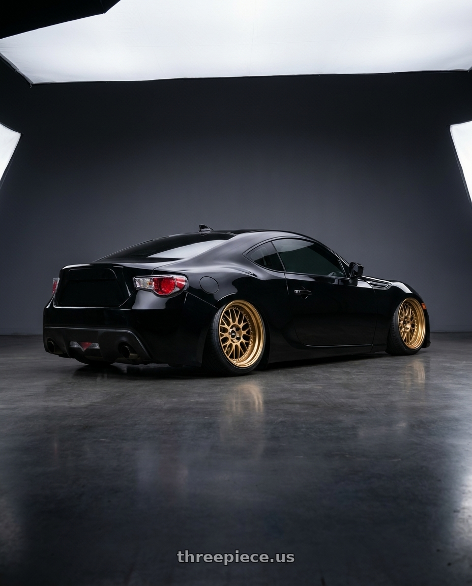 2016 Subaru BRZ with Work Meister M1 3p 5x100 18x8.5+17 R Disk Titanium Gold wheels rear three quarter view slight stretch tires