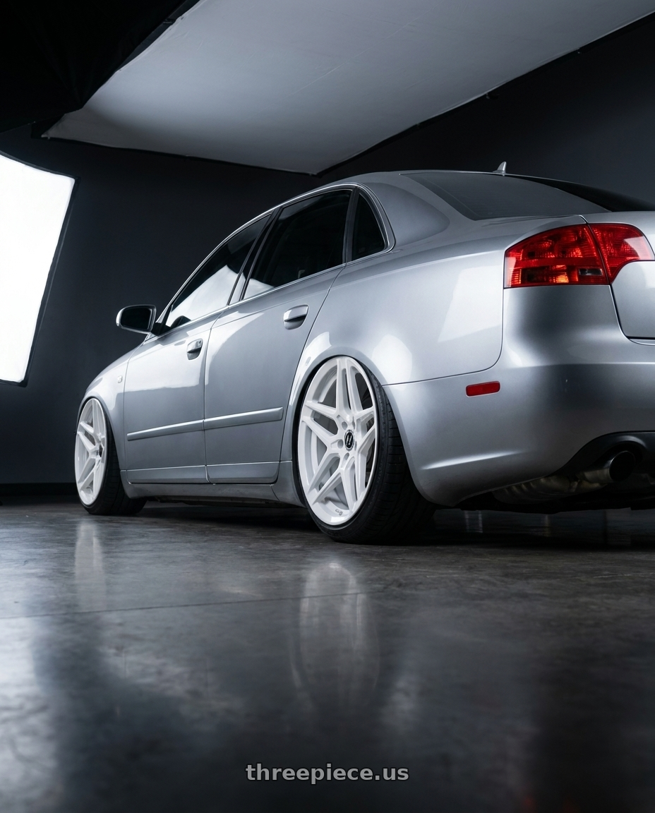 2007 Audi a4 with HERITAGE WHEEL EBISU MONOC 5x112 19x8.5 +35 WHITE wheels rear three quarter view extreme stretch tires