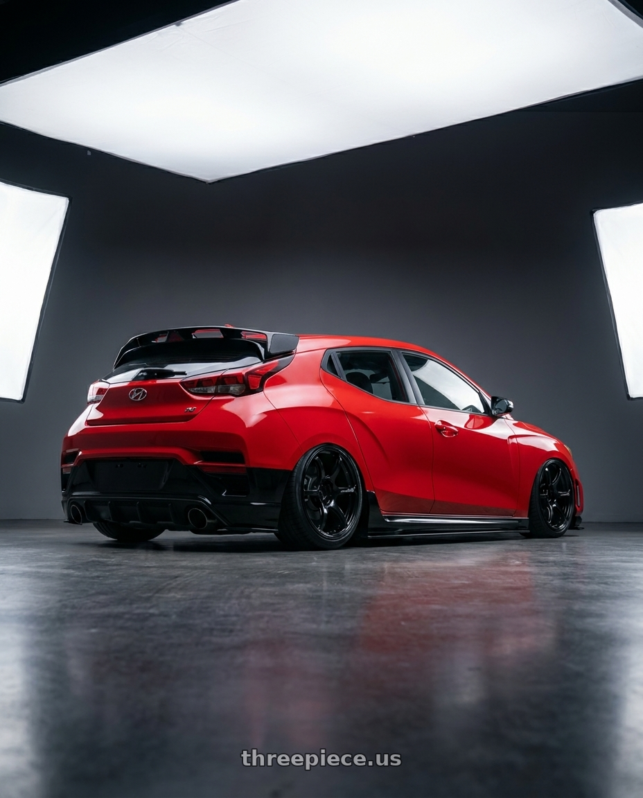 2022 Hyundai Veloster N with Advan RGIII 5x114.3 19x9.0+25 Gloss Black wheels rear three quarter view slight stretch tires