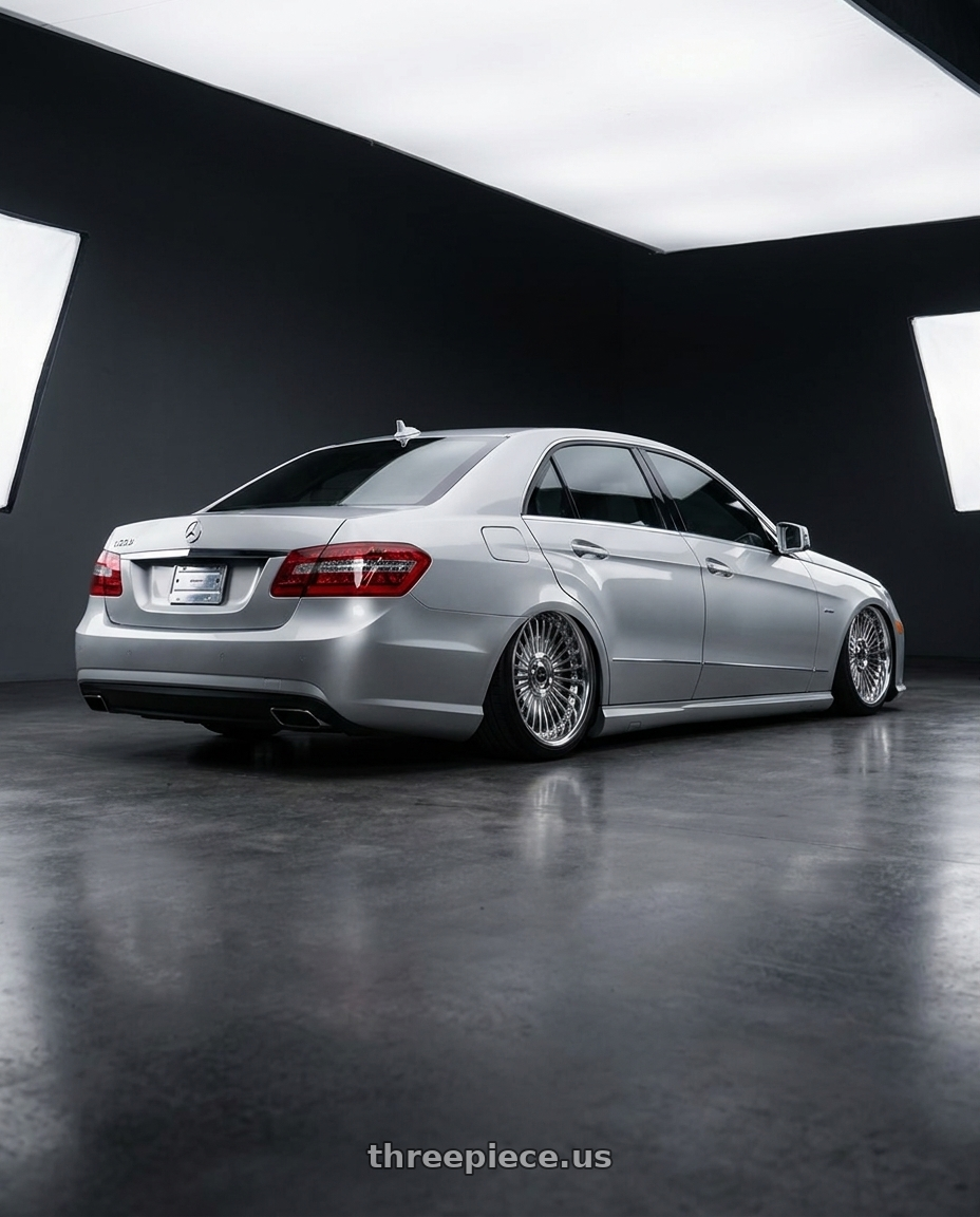 2010 Benz e550 with Work Emitz Black Polish 5x100 19x9.0 +12 wheels rear three quarter view slight stretch tires