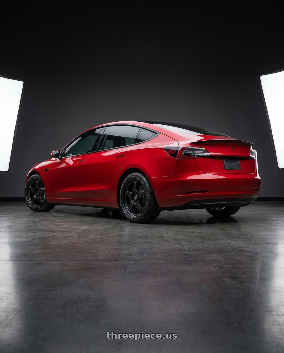 2022 Tesla Model 3 Performance with Vors SP1 4x100 15x7  +35 All Matte Black wheels rear three quarter view square tires