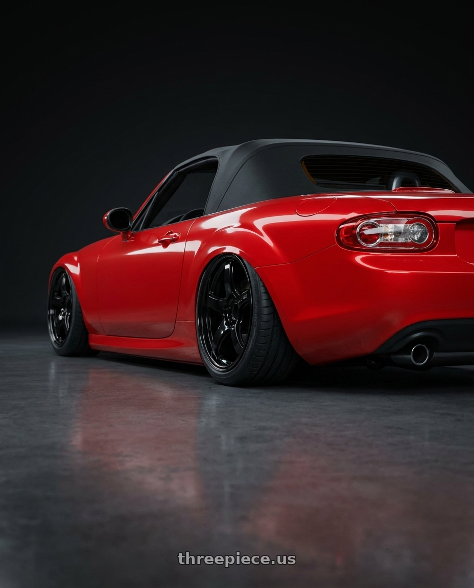 2012 Mazda MX-5 Miata NC with Gram Lights 57CR 5x114.3 17x9+12 Glossy Black wheels rear three quarter view slight stretch tires