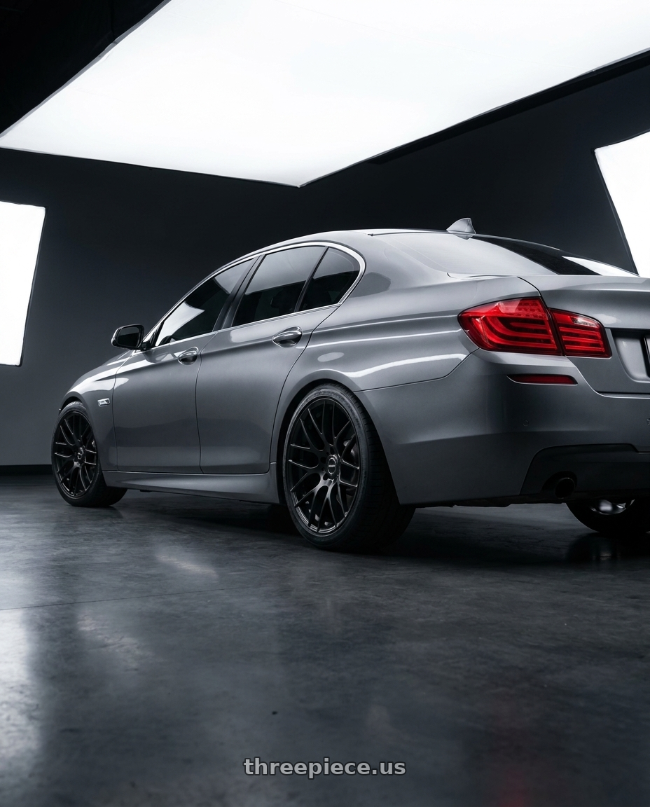2016 BMW 5 Series F10 with Avant Garde Wheels M359 5X120 19x9 +35 Matte Black wheels rear three quarter view square tires