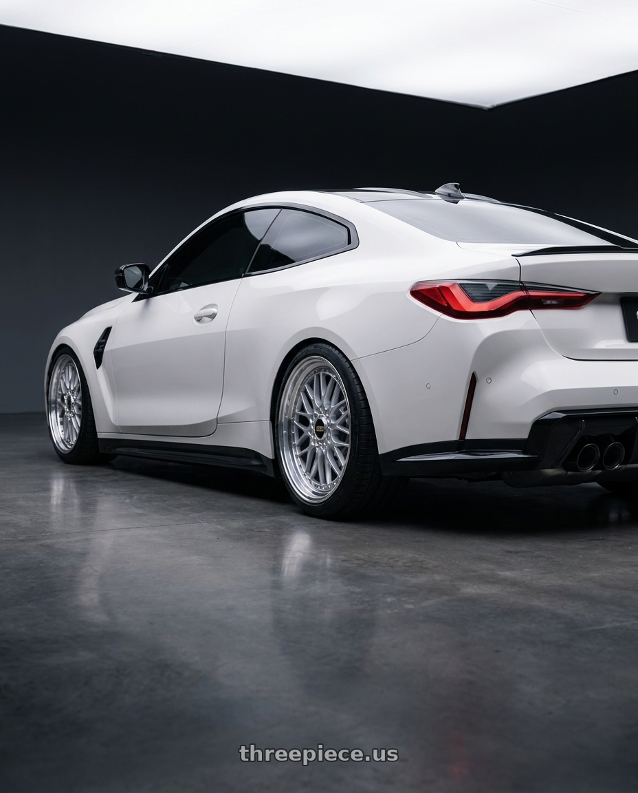 2026 bmw m4 with BBS Super-RS 5x112 19x9.0+42 Silver wheels rear three quarter view square tires