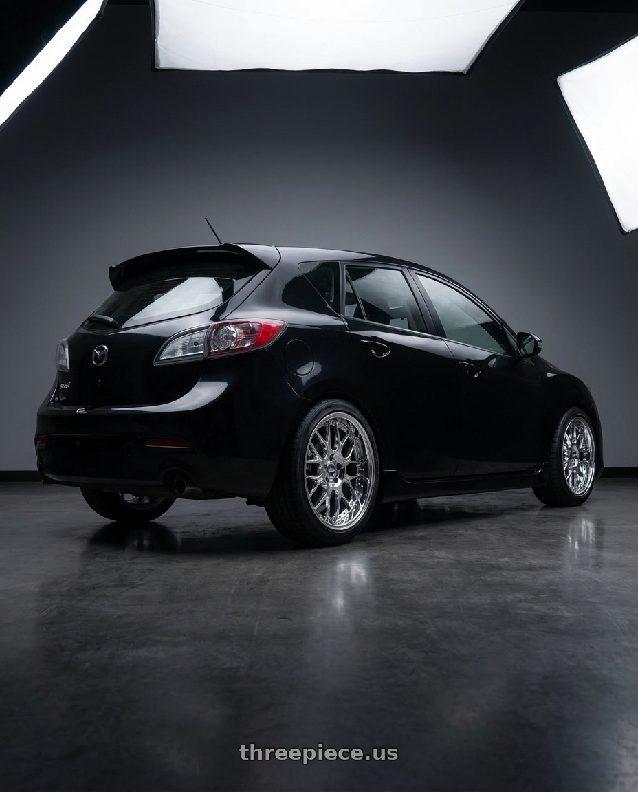 2012 Mazda 3 hatchback skyactiv with ESR Wheels CS18 5x114.3 18x10.5 +22 Vacuum Chrome wheels rear three quarter view square tires