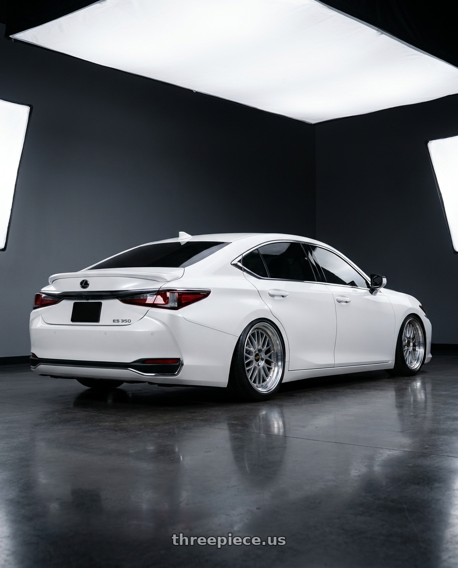2022 es 350 with BBS LM 5x130 18x11.0+56 Diamond Silver wheels rear three quarter view extreme stretch tires