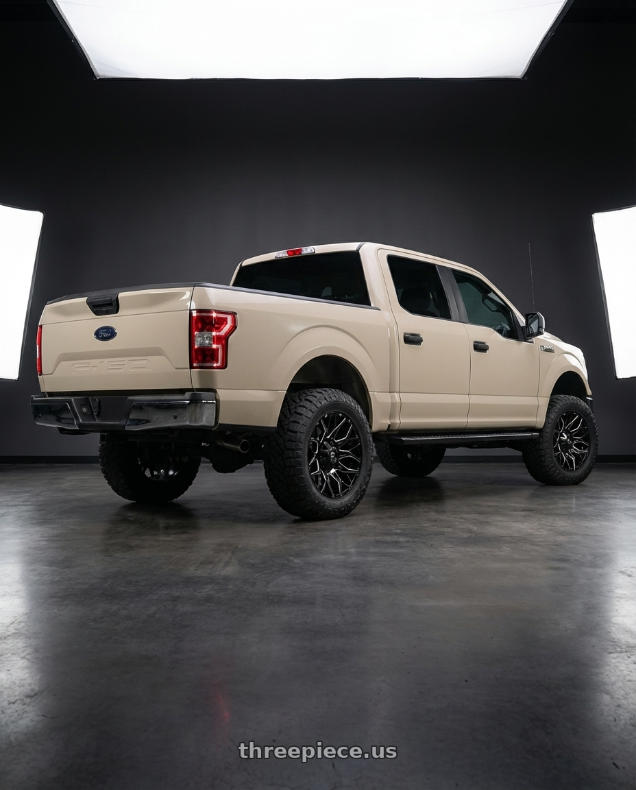 2019 Ford F-150 with Fuel 1PC D769 TWITCH 6X135/6X139.7 20X9 +1 GLOSSY BLACK MILLED wheels rear three quarter view meaty tires