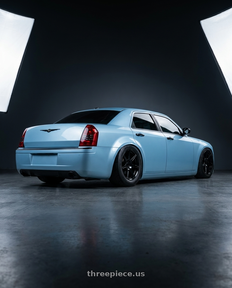 Ice blue 2007 Chrysler 300 srt8 satin black trim black mesh grill hellcat hood with Voxx Replica Mustang GT500 5x114.3 20x9+35 Gloss Black wheels rear three quarter view excessive tires