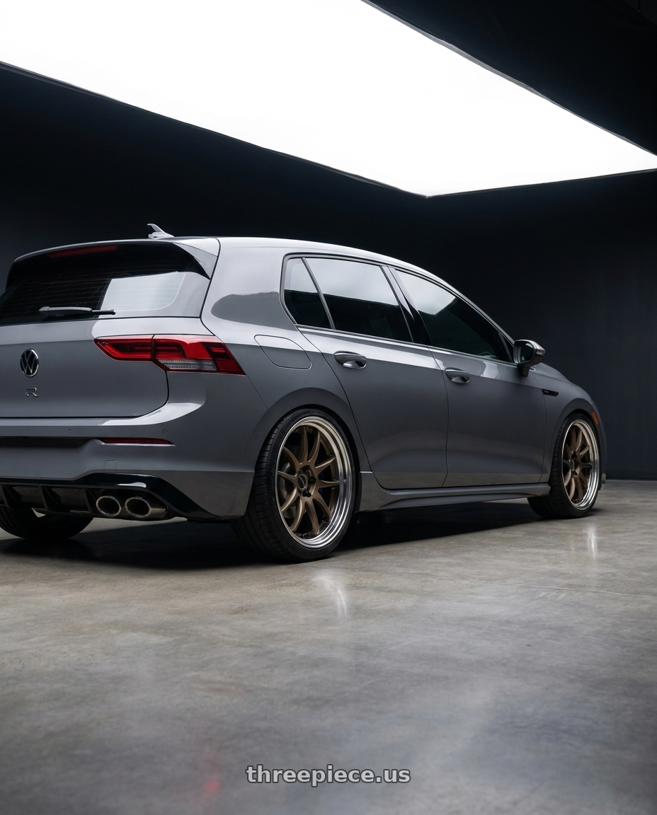 2026 Volkswagen Golf R Graphite with Work Cr 2P 5x112 18x8.5 +45 Matte Bronze wheels rear three quarter view square tires