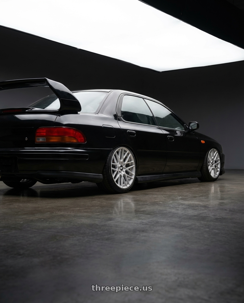 1998 Subaru Impreza GC8 with Rotiform 1PC R140 RSE 5X100/5X114.3 17X8 +40 GLOSS SILVER wheels rear three quarter view slight stretch tires