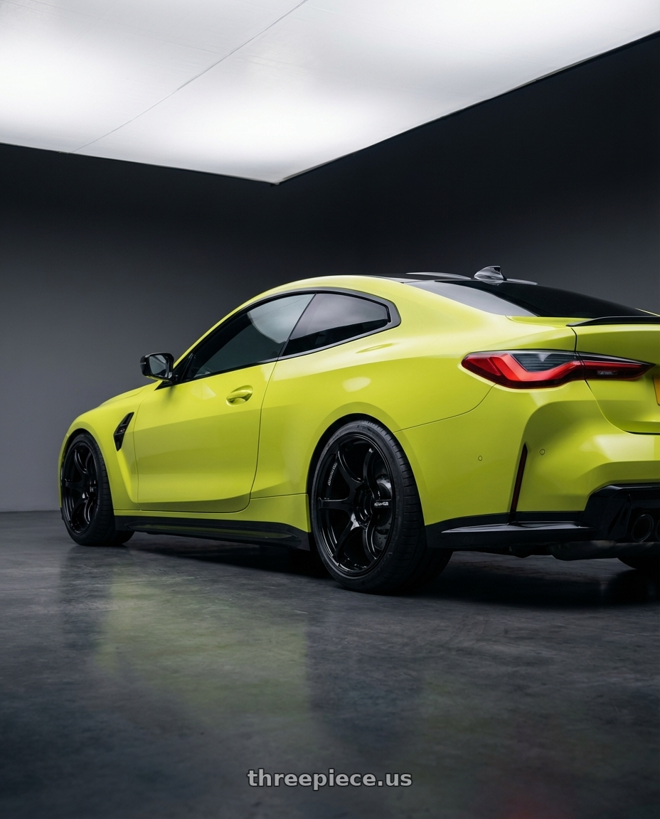 2024 BMW M4 G82 with Advan RGIII 5x112 19x8.5+45 Gloss Black wheels rear three quarter view square tires