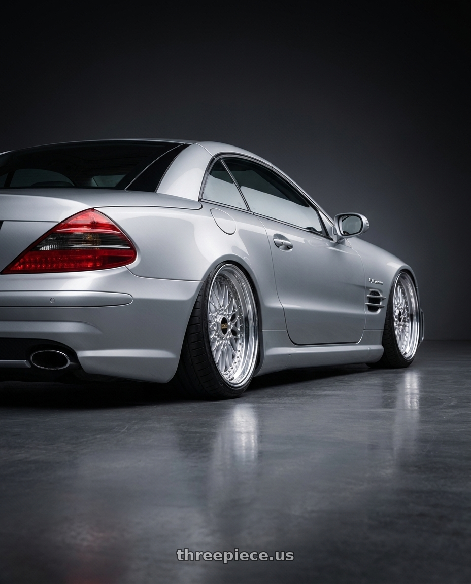 2006 Mercedes SL500 with BBS Super 5x112 19x10 +40 Diamond Silver wheels rear three quarter view extreme stretch tires